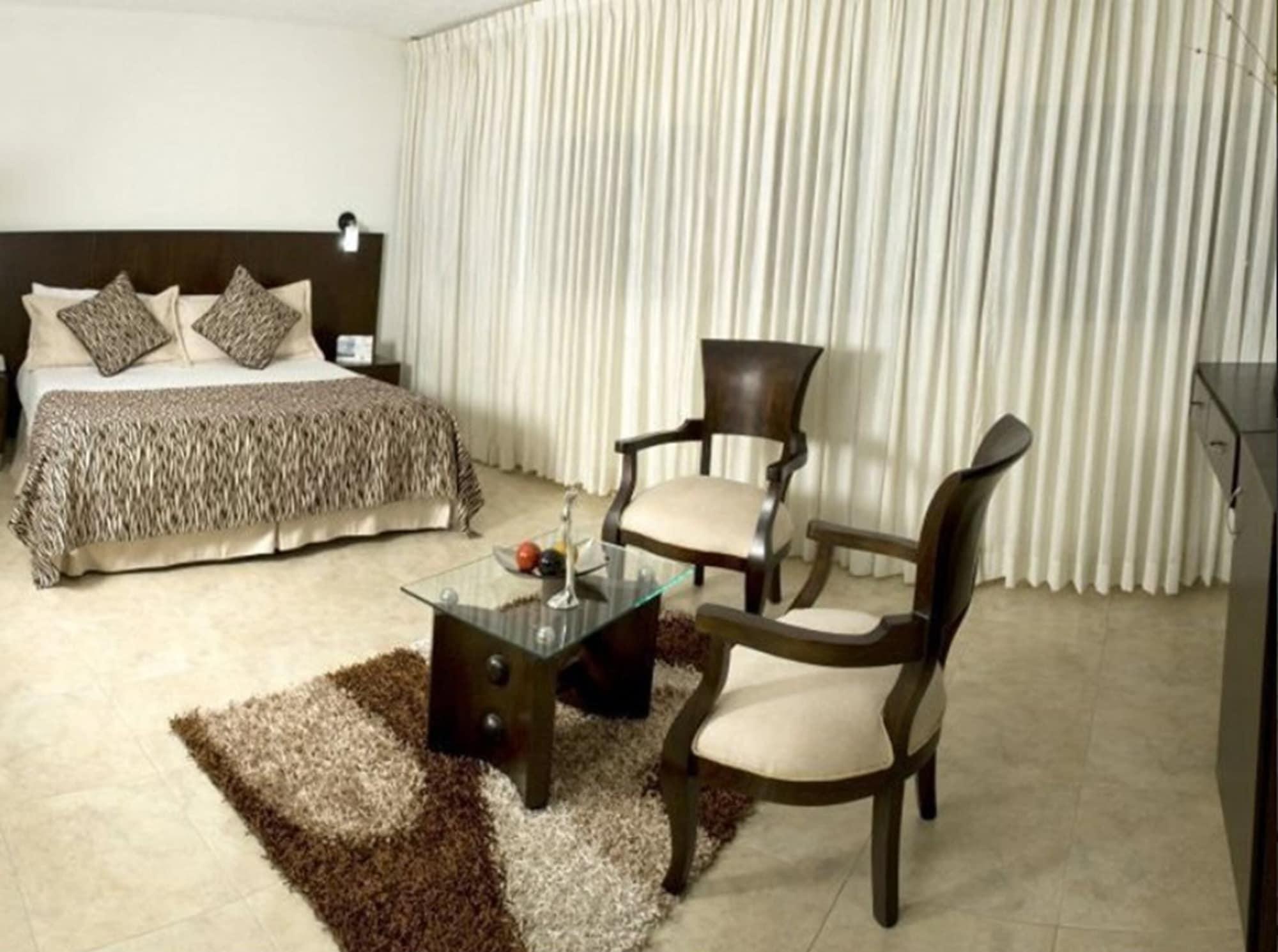 Hotel Casino Internacional Cucuta Exterior photo A bedroom at the hotel