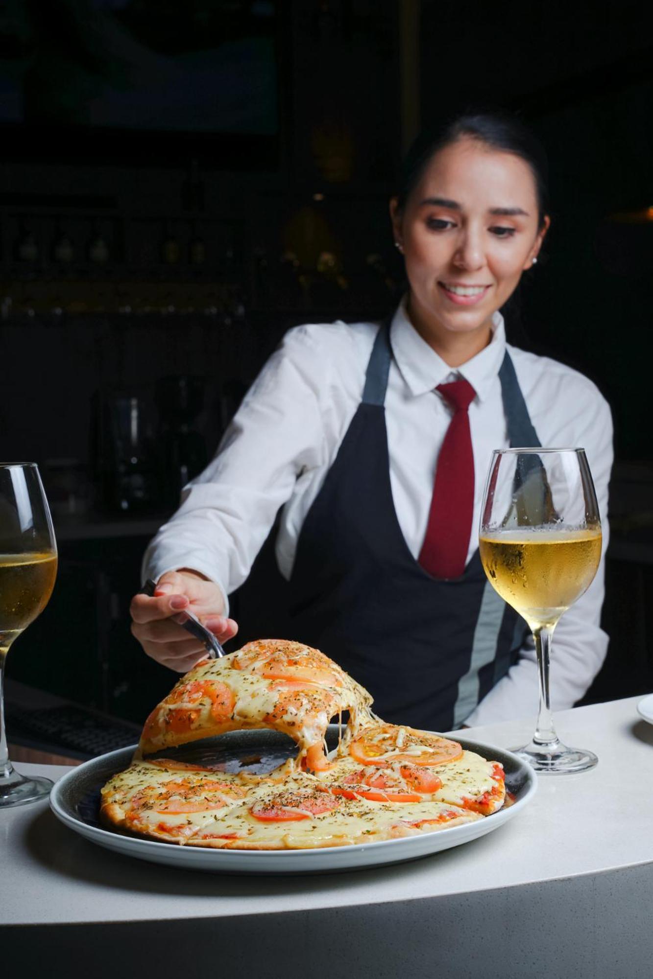 Hotel Casino Internacional Cucuta Exterior photo A waitress serving food