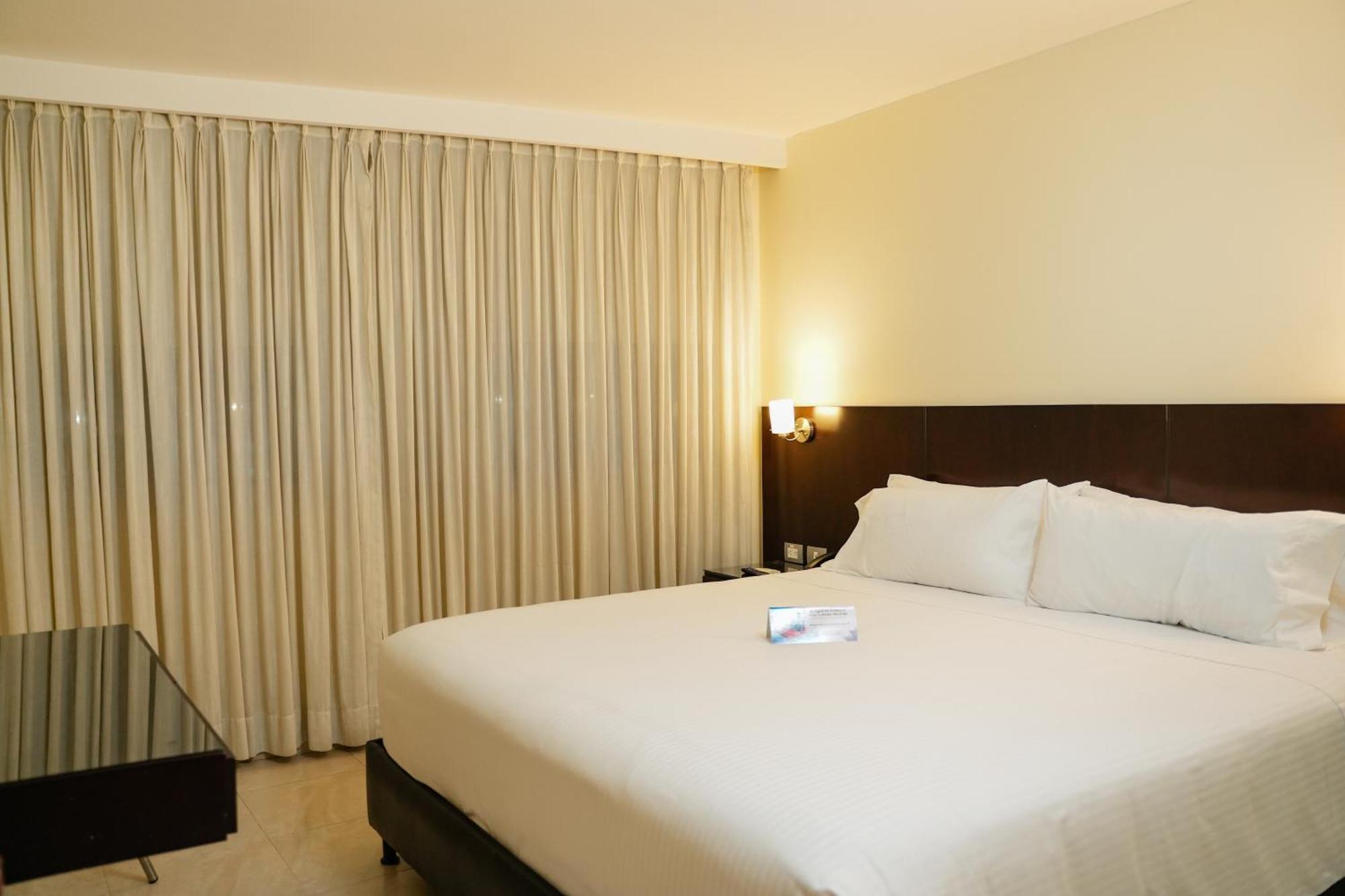 Hotel Casino Internacional Cucuta Exterior photo A bedroom at the hotel