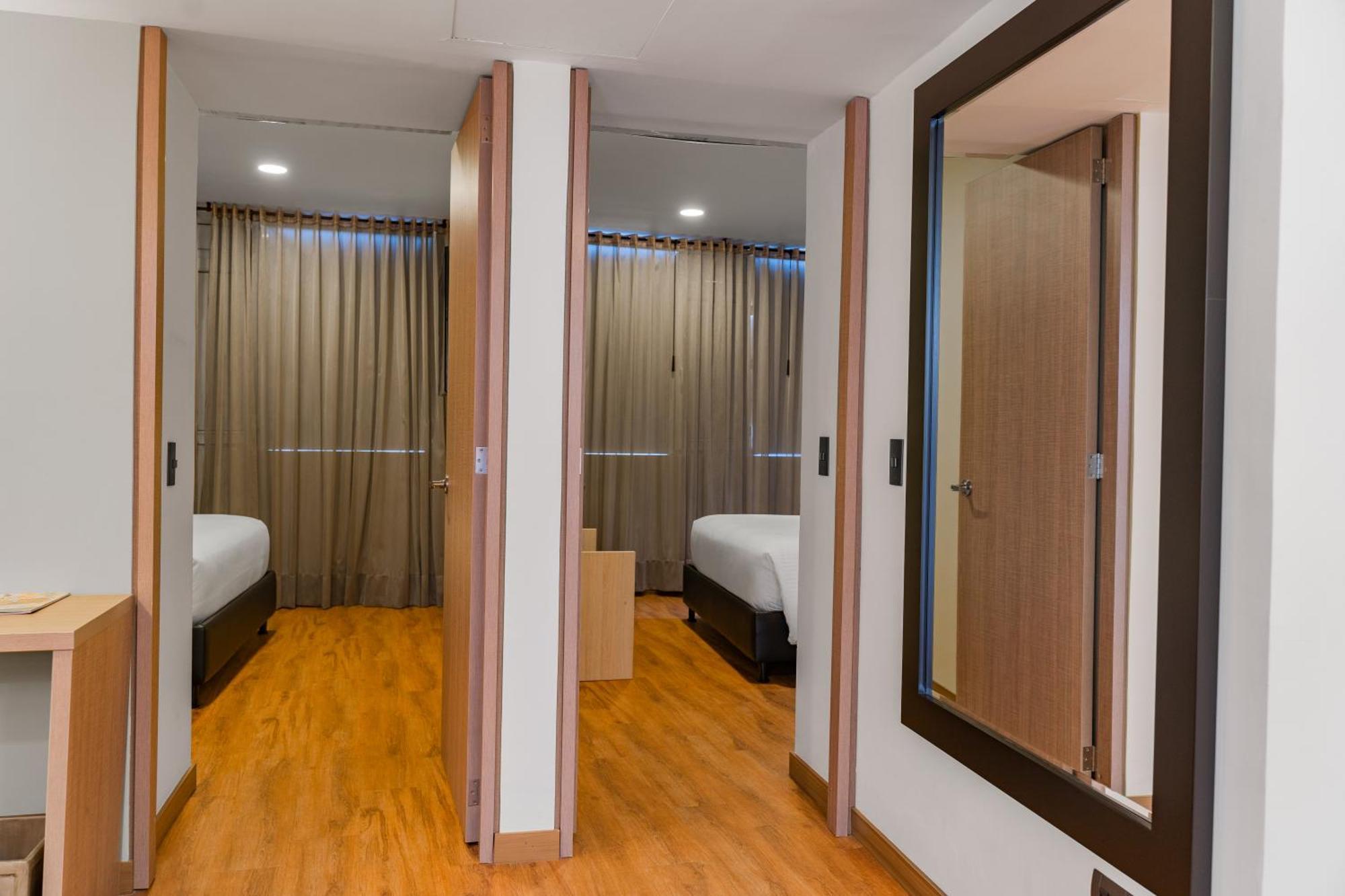 Hotel Casino Internacional Cucuta Exterior photo A typical bedroom at the University of Nottingham's Jubilee Hall